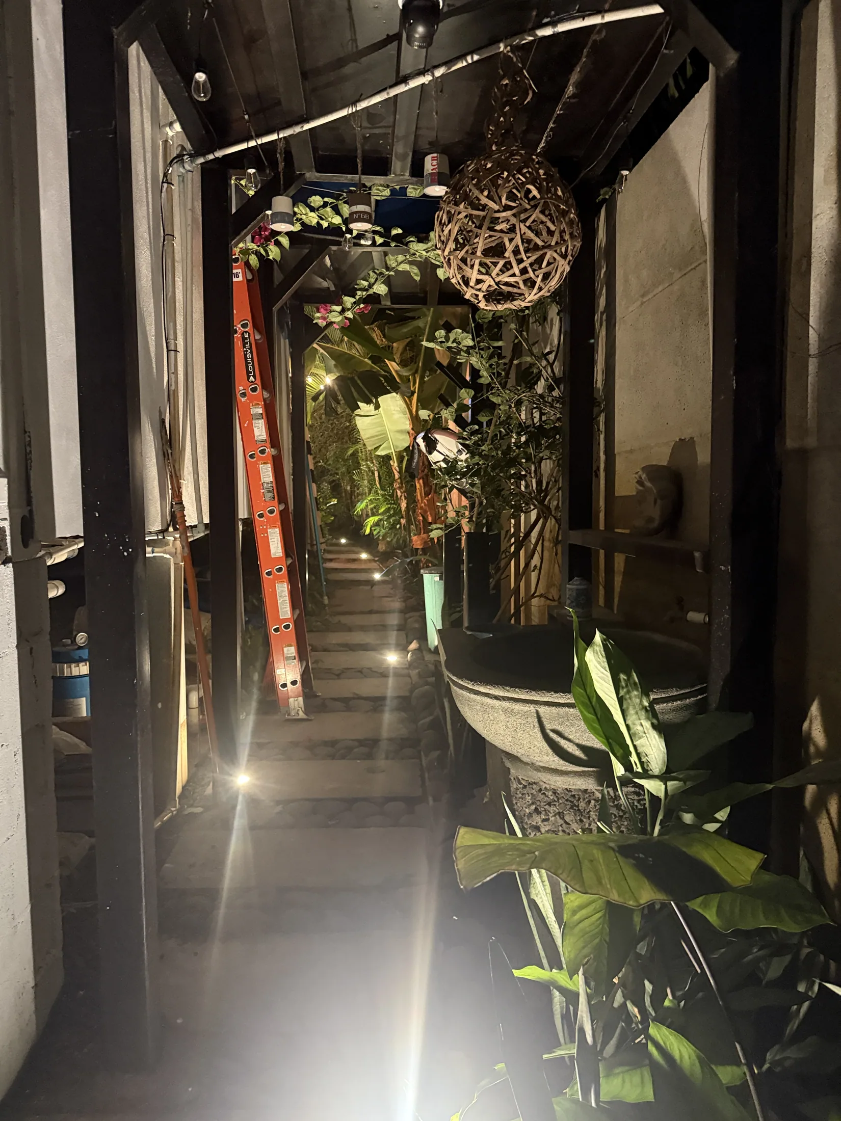 Covered outdoor corridor at night